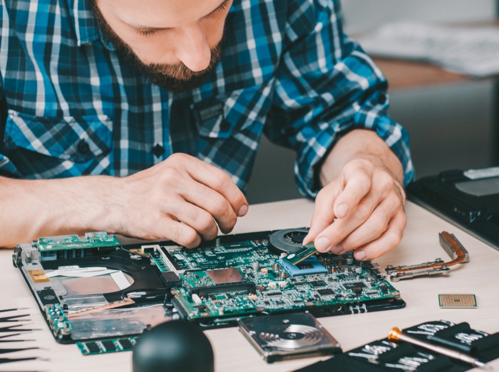 Laptop screen repair on bench at Geeks On Call Auckland
